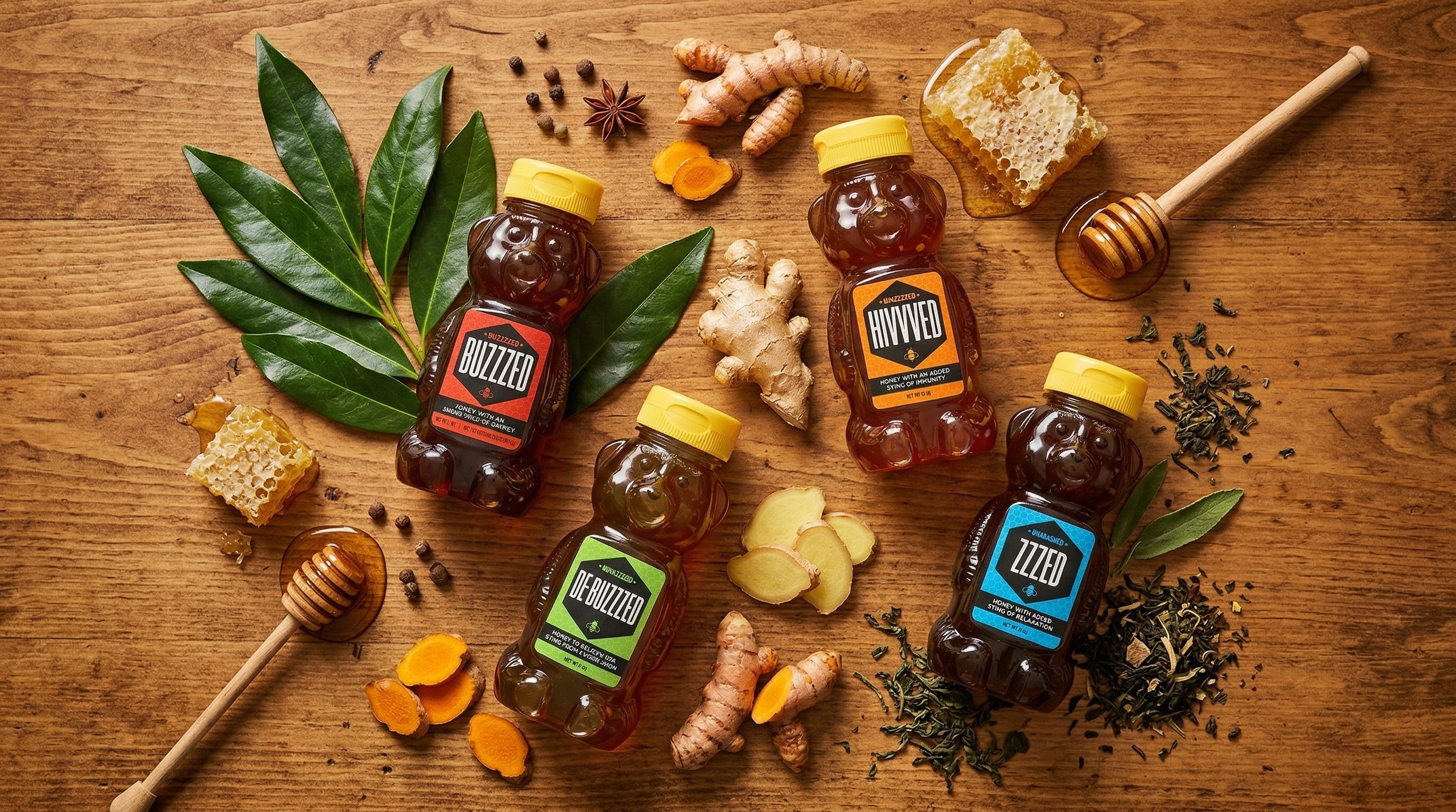 Four Unabashed Honey bears surrounded by their natural ingredients — guayusa leaves, ginger, turmeric, tea leaves, and honeycomb